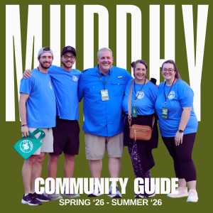 Picture of volunteers at event with the text community guide spring 26 - summer 26.